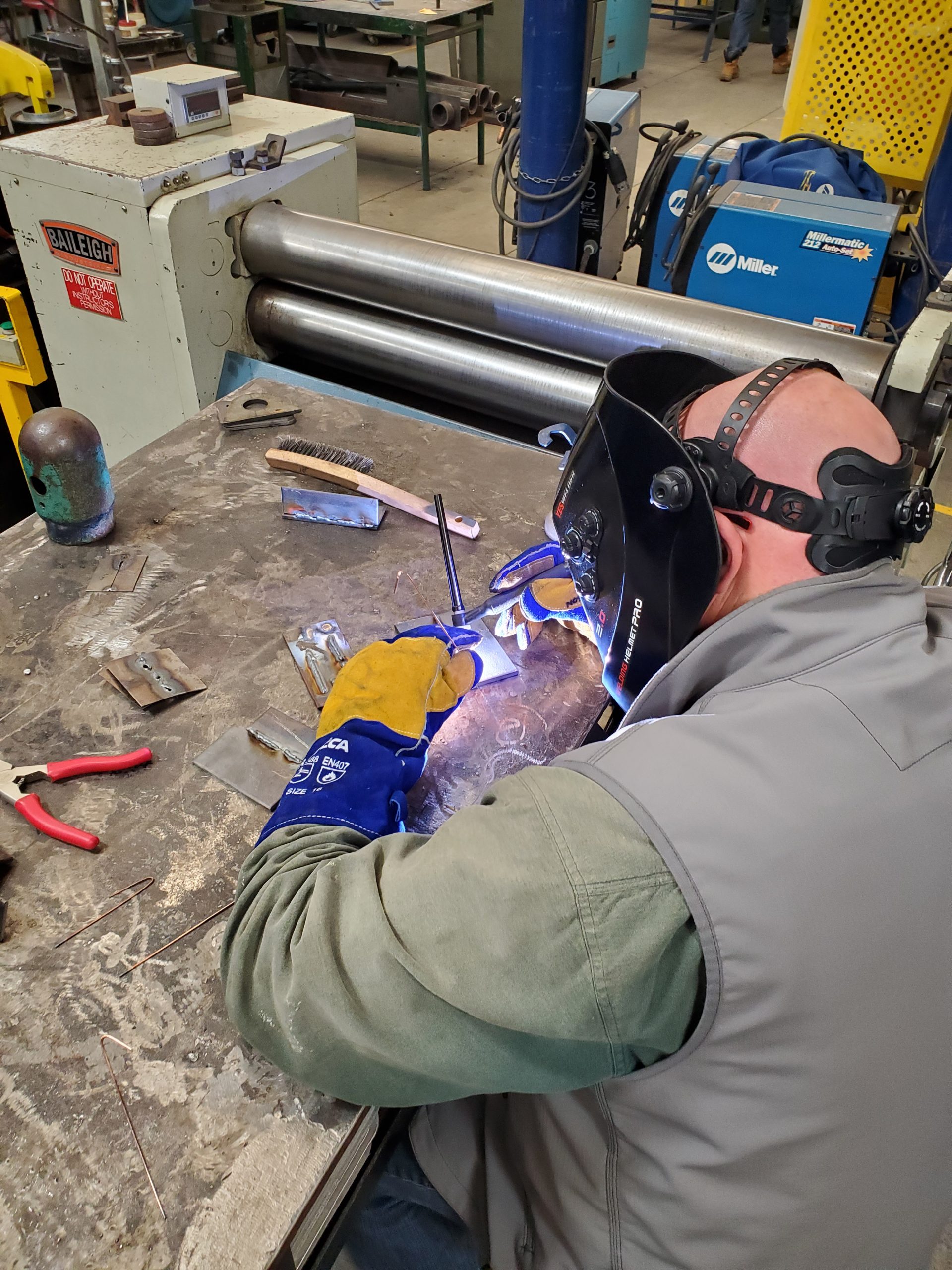 Welding working on a piece in the Mig Tig Class 2022